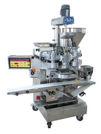 Machine encroûtante et de formation automatique triphasée pour la fabrication de boulette